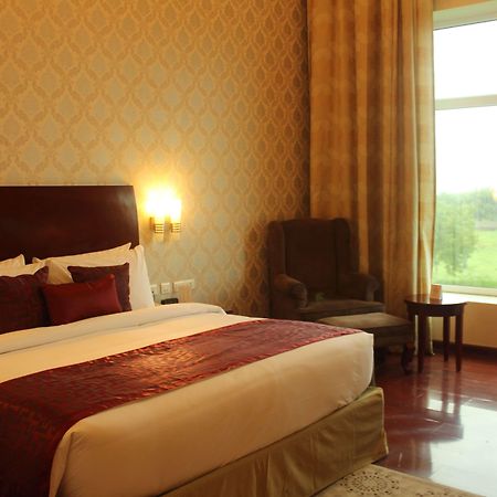 Отель Ramada By Wyndham Jaipur Jaisinghpura Экстерьер фото