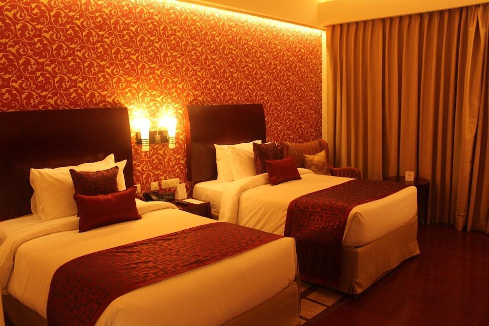 Отель Ramada By Wyndham Jaipur Jaisinghpura Экстерьер фото