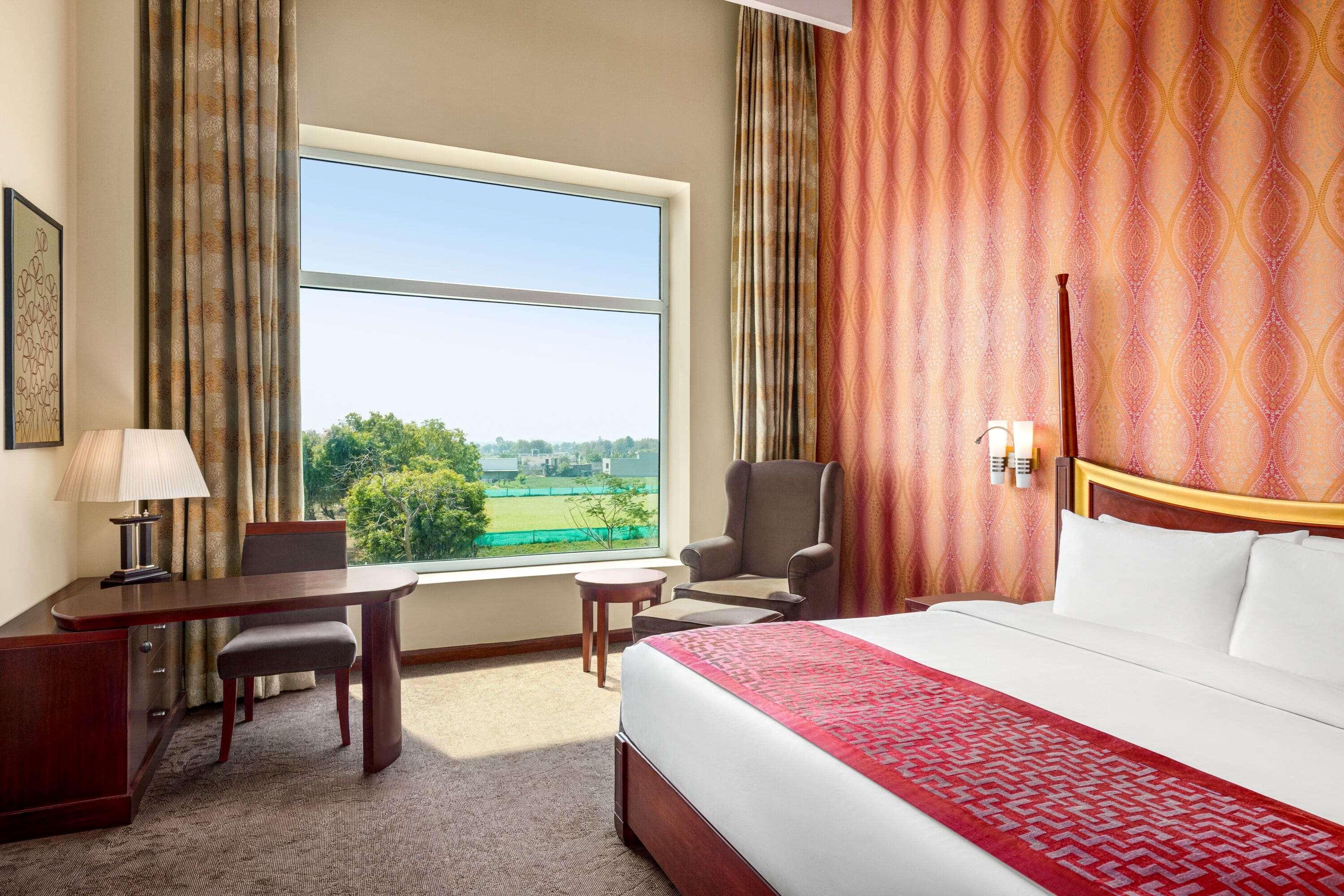 Отель Ramada By Wyndham Jaipur Jaisinghpura Экстерьер фото