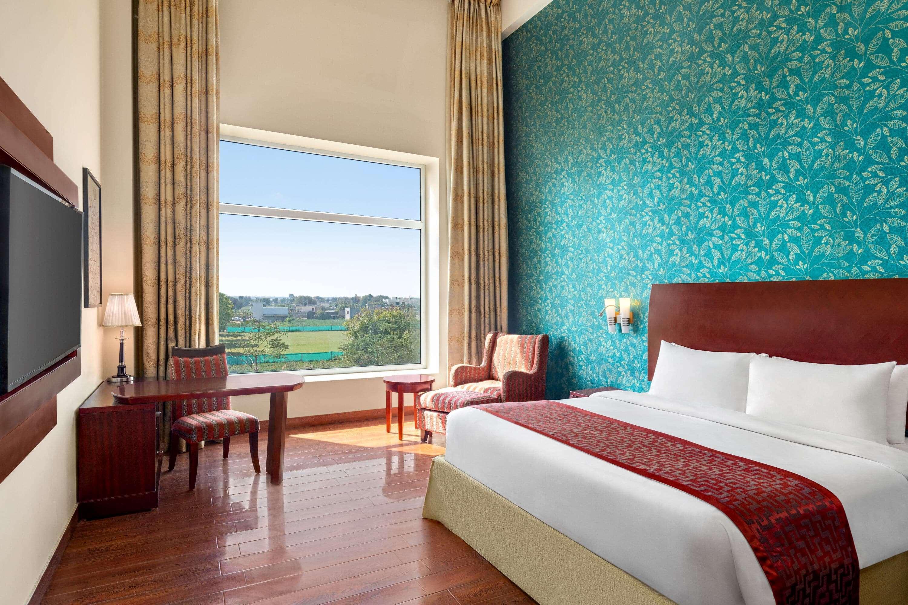 Отель Ramada By Wyndham Jaipur Jaisinghpura Экстерьер фото